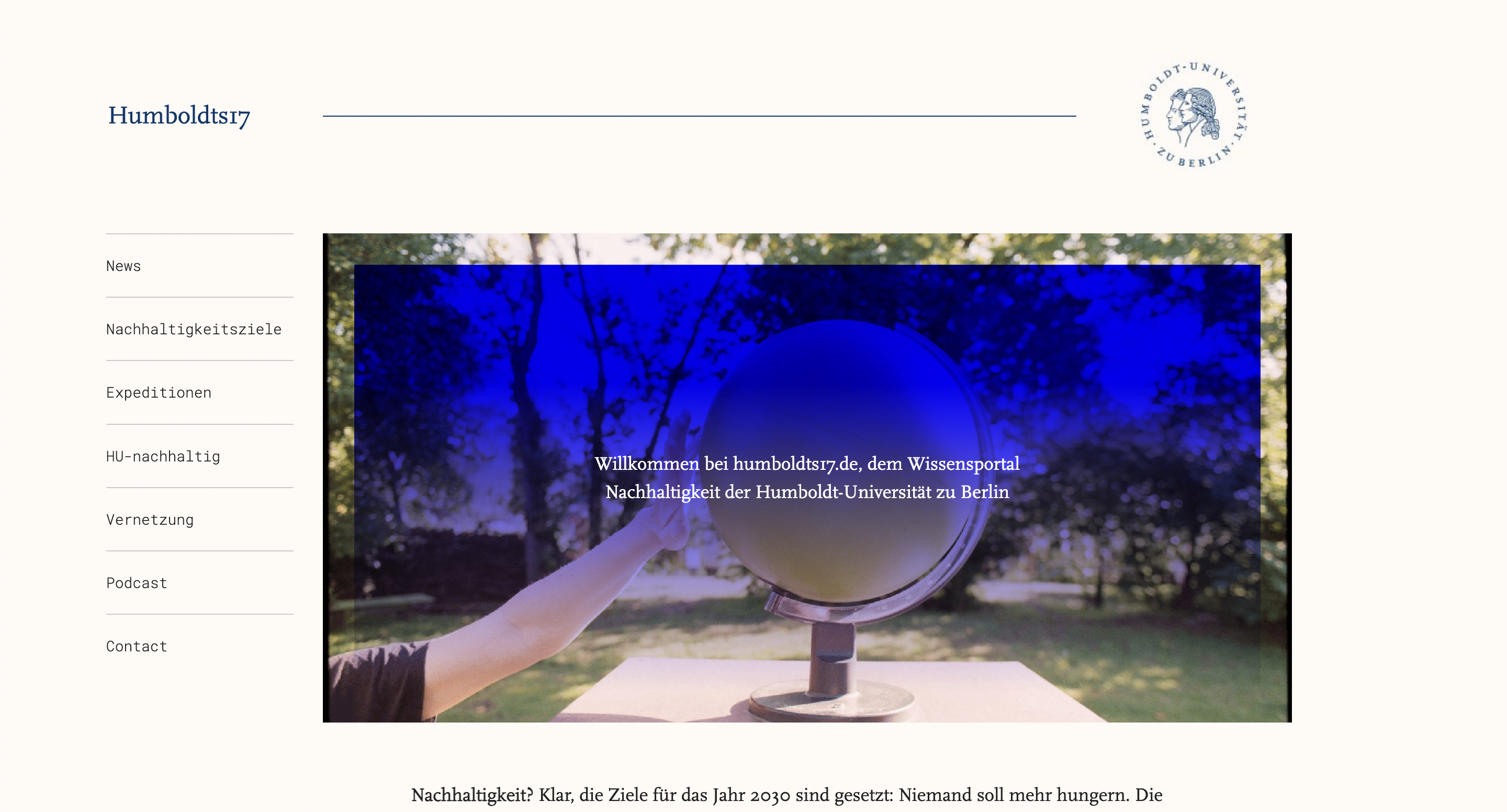 A clean and light webpage design. Menu on the left, the seal of the humboldt university on the top right. A huge image of a hand touching a globe that is standing in a sunny garden is in the center.