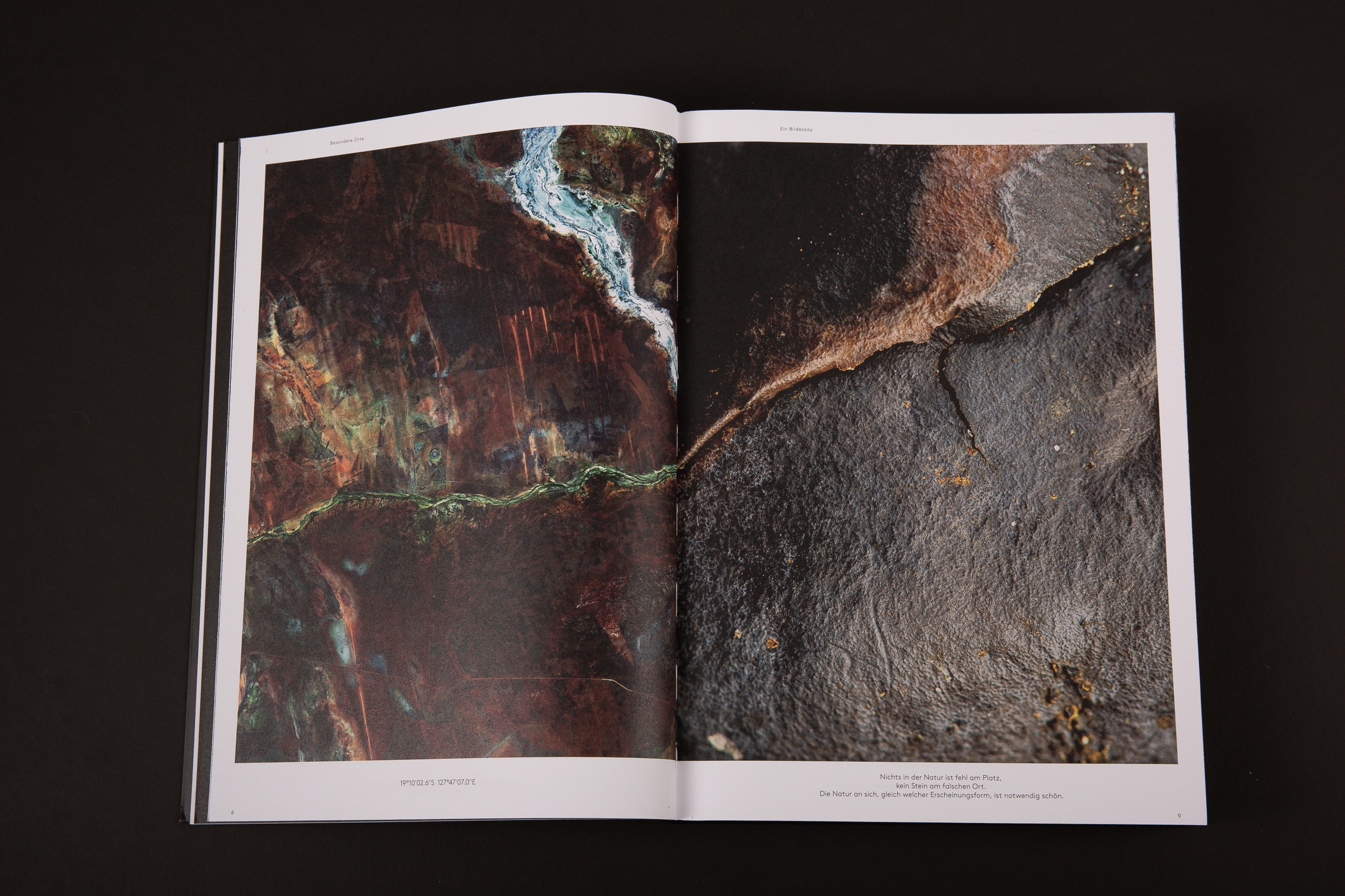 An image of Selux Imagebook, showcasing a double page spread of a satellite image and a macro image side by side with their respective coordinates underneath.