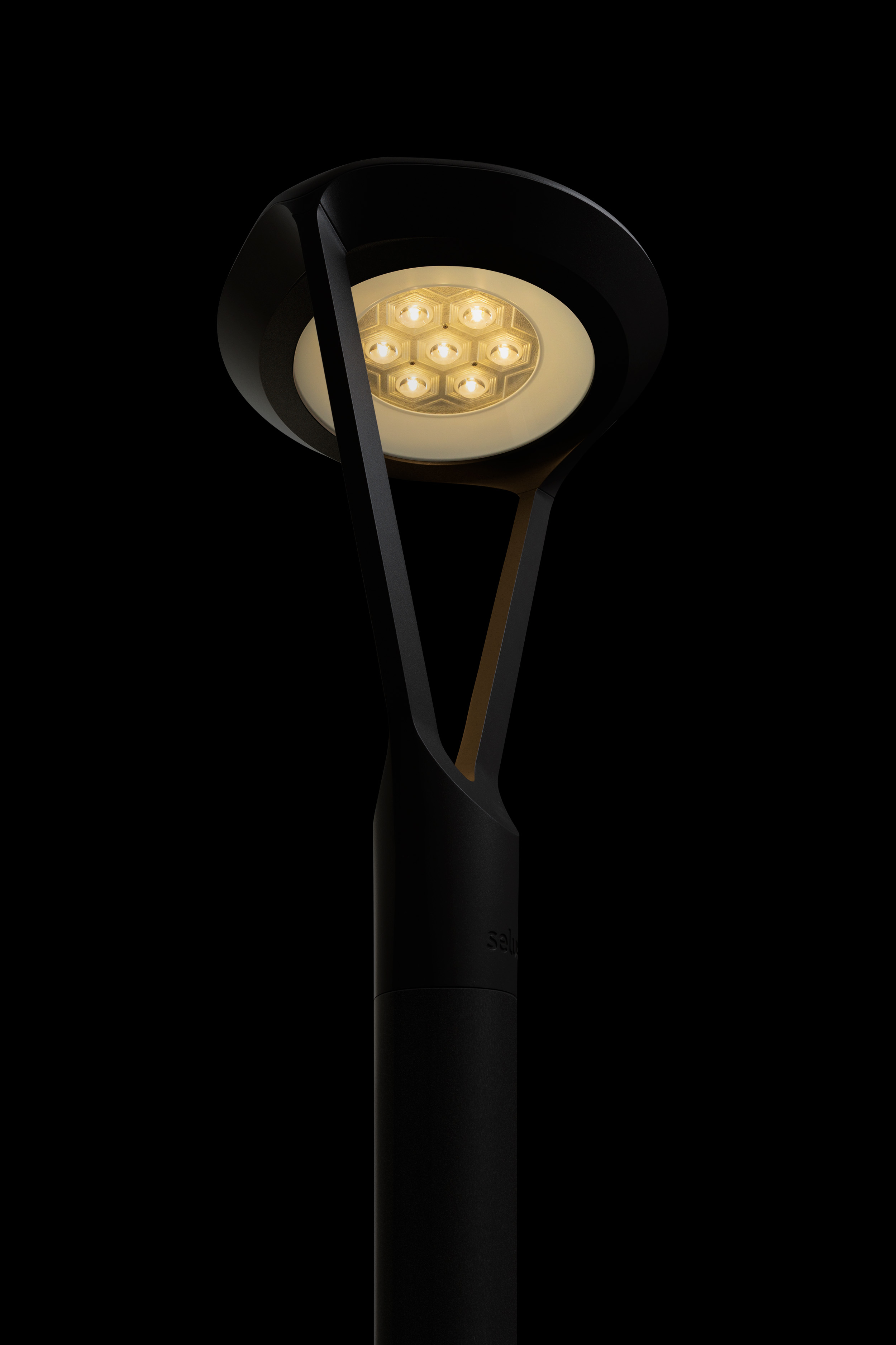 An image of Mistella luminaire on a black background at a low angle showing the light module.