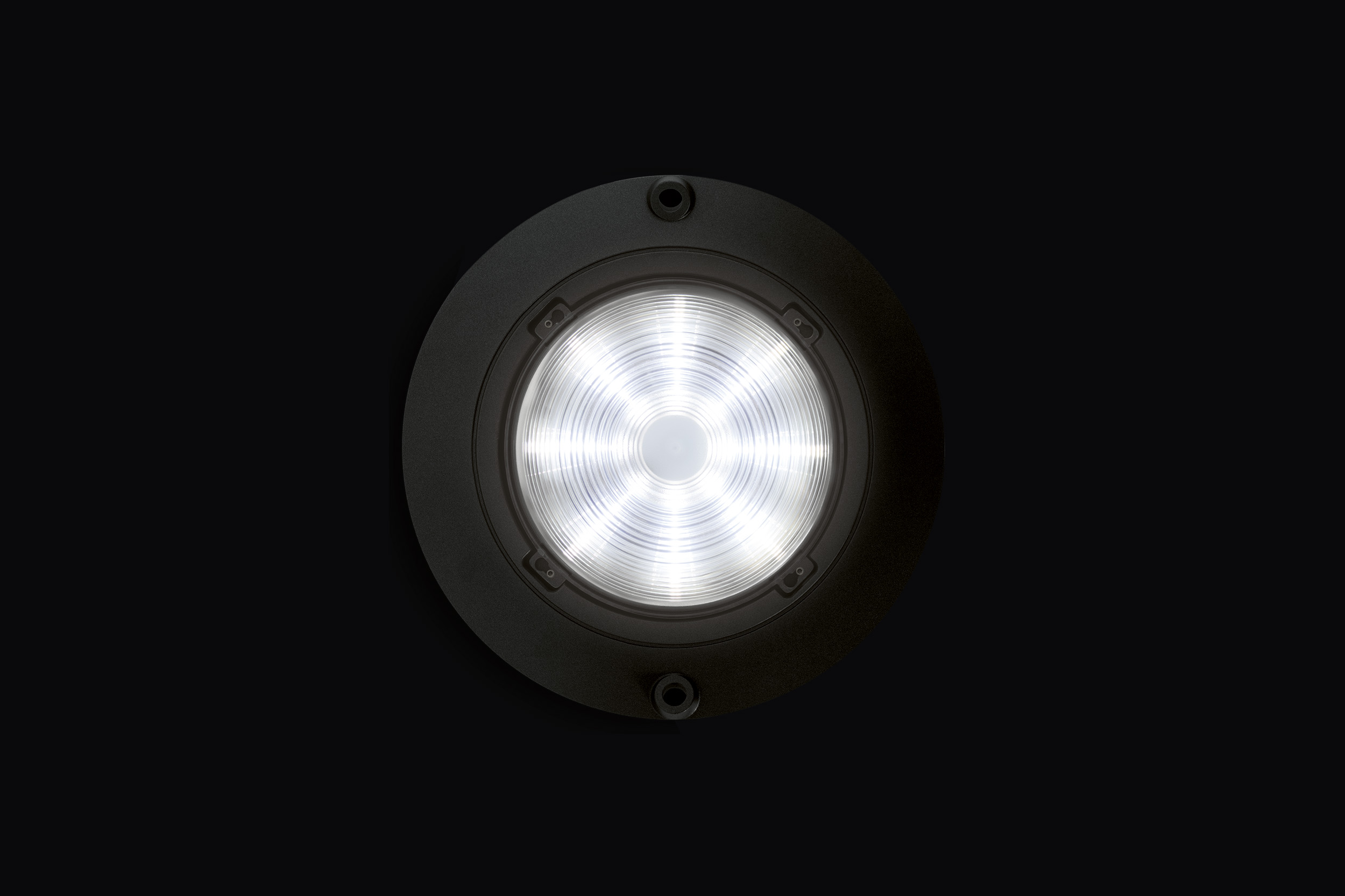 An image of Trigo luminaire showing the light module on a black background.