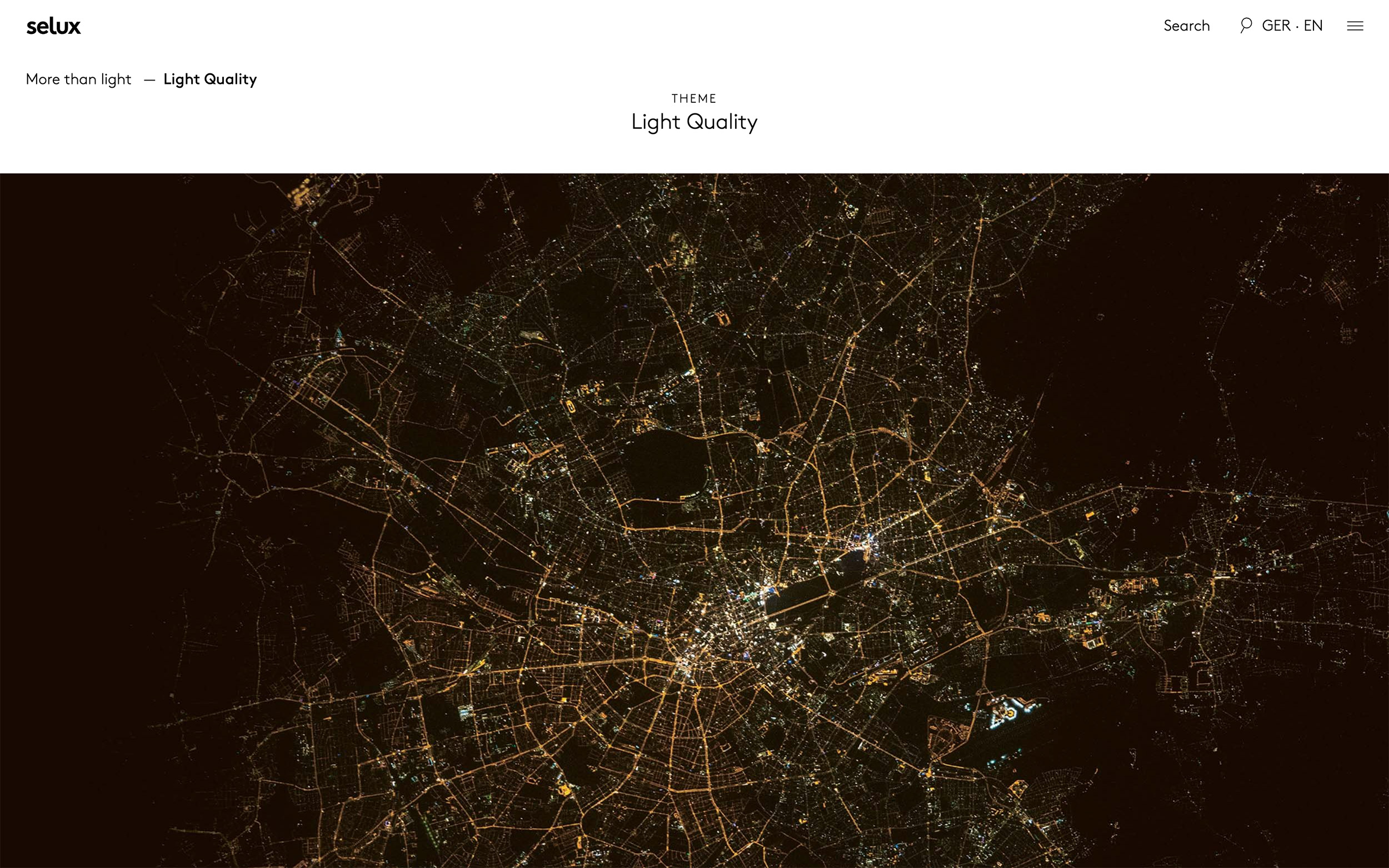 An image showcasing the Theme page titled Light Quality with headline at the top and a full width satellite image of a city during night time underneath.